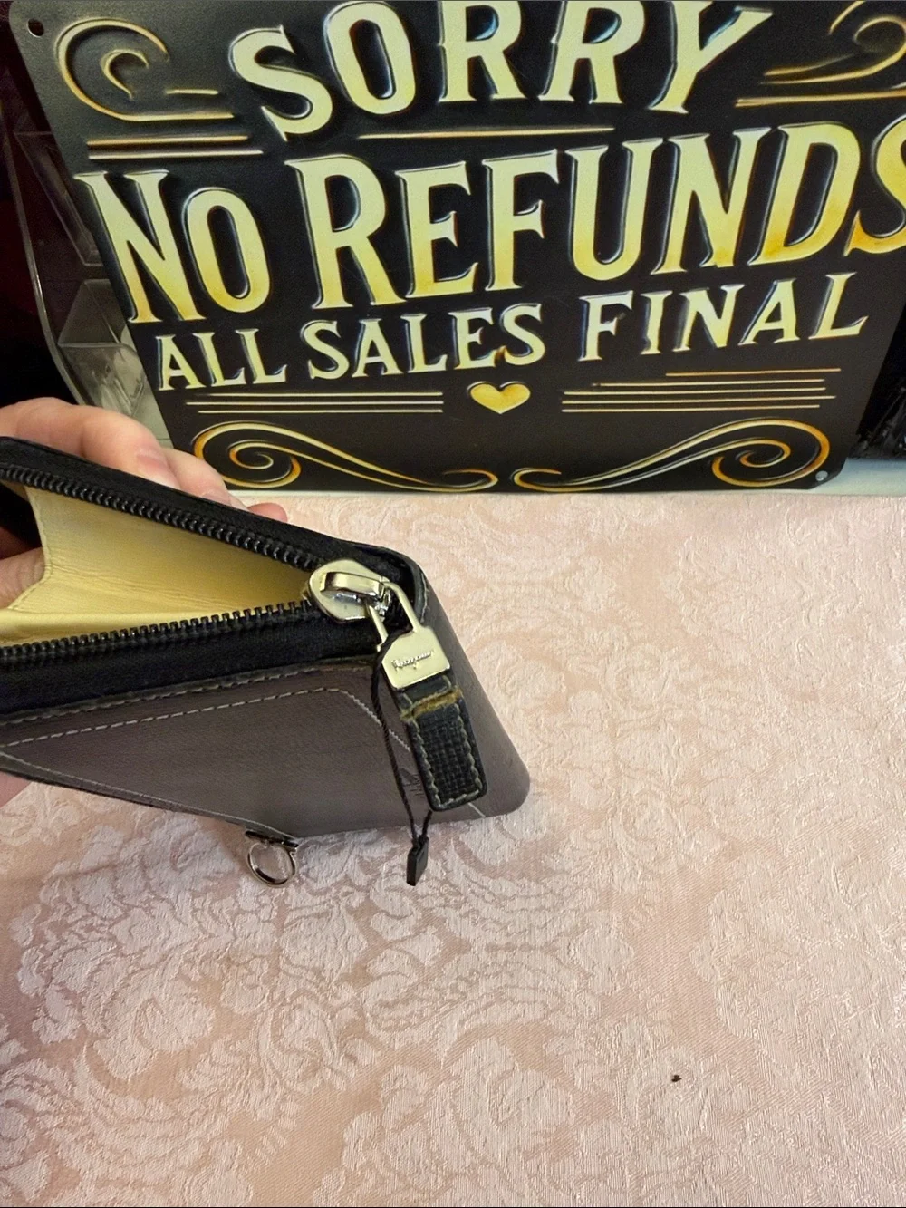 Salvatore Ferragamo Black Leather Zip Wallet with Silver Hardware